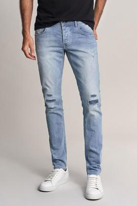 CLASH SKINNY FIT JOGGER DENIM AZUL CON ROTOS