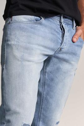 CLASH SKINNY FIT JOGGER DENIM AZUL CON ROTOS