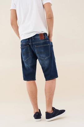 BERMUDAS LOOSE JOGGER CON ROTOS EN DENIM AZUL