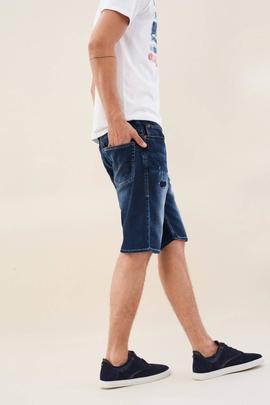 BERMUDAS LOOSE JOGGER CON ROTOS EN DENIM AZUL