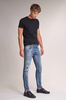 CLASH SKINNY FIT PREMIUM WASH CON ROTOS Y GATEADOS