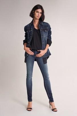 WONDER PUSH UP SKINNY FIT EN DENIM AZUL CON TACHUELAS