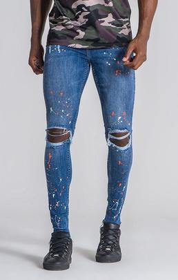 PANTALÓN VAQUERO ELÁSTICO CON SALPICADURAS DE PINTURA NEÓN