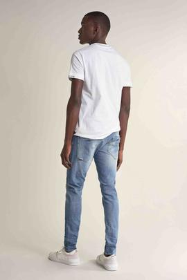 CLASH SKINNY FIT EN DENIM AZUL CON ROTOS Y GATEADO