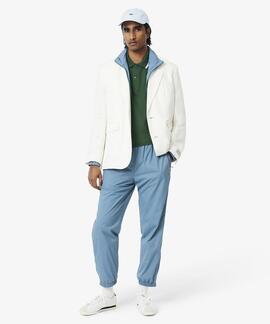 POLO LACOSTE REGULAR FIT 132 VERDE CON RIBETES DECORATIVOS