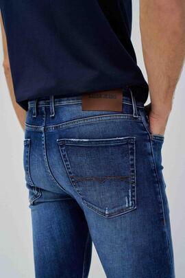 PANTALÓN VAQUERO SKINNY FIT MEDIUM RISE DENIM AZUL CON ROTOS