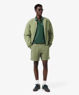 POLO CORTE CLÁSICO CON DETALLE EN EL BOLSILLO VERDE